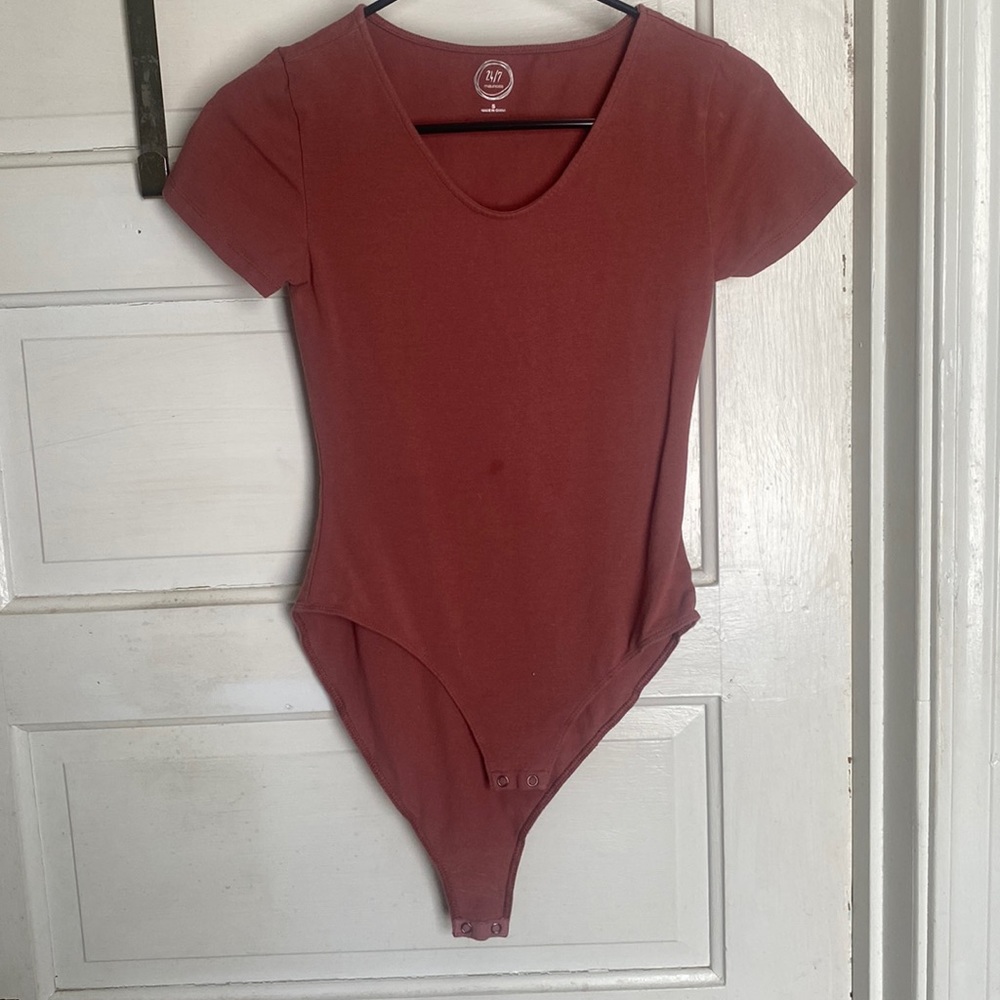 Maurice’s body suit barely worn size small